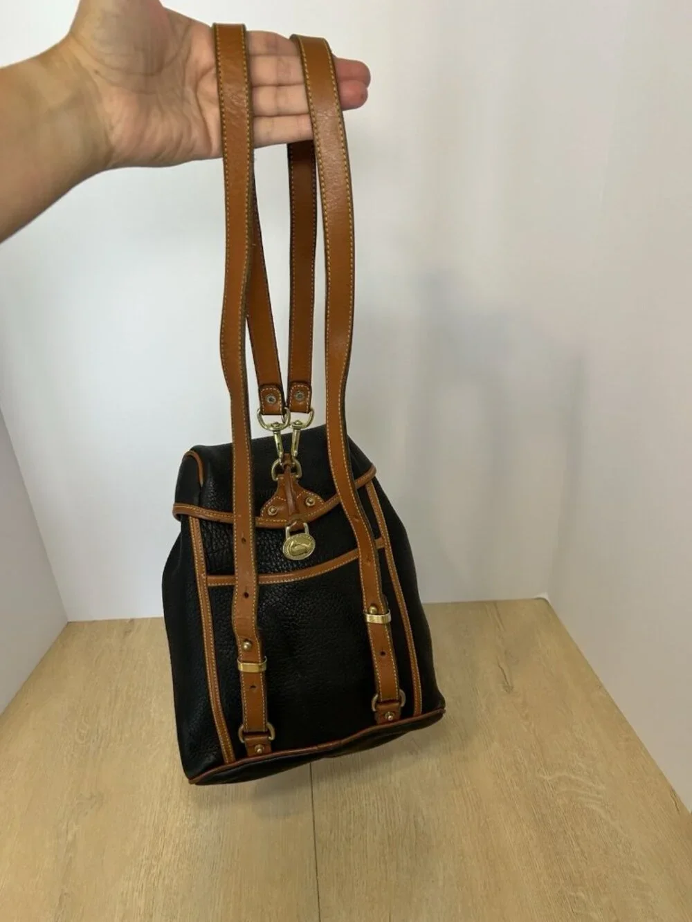 Vintage Dooney & Bourke Black Tan Color All Weather Leather Backpack